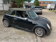 A 2005 Black Mini Convertible Car Currently declared SORN with no MOT Mileage 26344