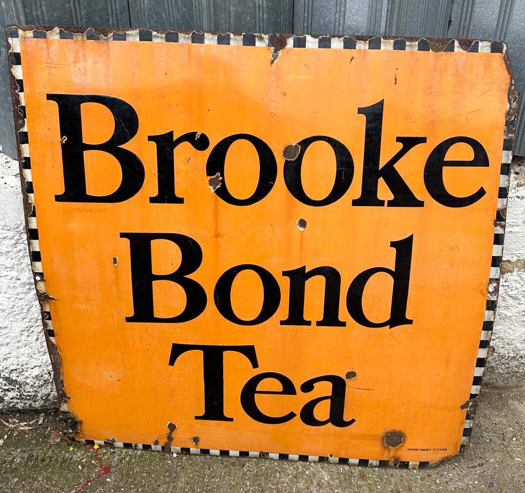 A Brooke Bond enamel sign 102cm x 102 cm approximately