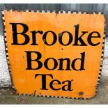 A Brooke Bond enamel sign 102cm x 102 cm approximately