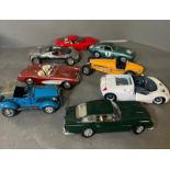 A selection of eight diecast cars, various makers and models