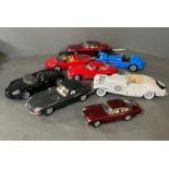 A selection of eight diecast cars, various makers and models