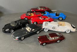 A selection of eight diecast cars, various makers and models