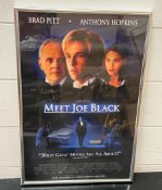 A signed film poster "Meet Joe Black" signed by Brad Pitt, Anthony Hopkins and Claire Forlan (41cm x