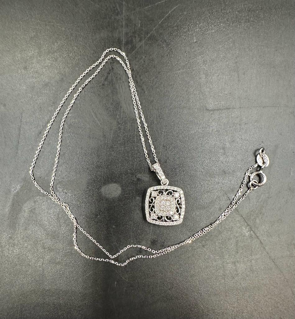 18 carat white gold diamond set pendant marked on the bale D0.358 18K 750 suspended on a 9 carat - Image 2 of 4