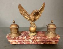 A French red marble and gilt bronze double ink well with central decorative eagle H15cm W22cm D10cm