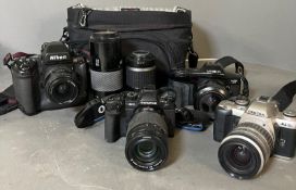 A selection of various cameras to include Nikkon, Olympus and Pentax.