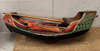 A Vintage Chinese Junk model boat wooden with red sails.