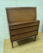 A Mid Century bureau with three drawers under, the front opening to two drawers and storage (H42cm
