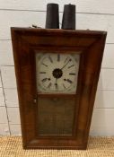 A vintage mahogany weight driven eight day wall clock