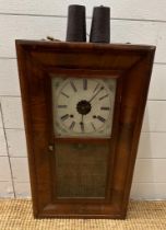 A vintage mahogany weight driven eight day wall clock