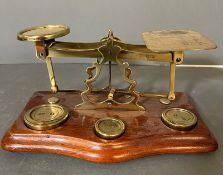 A STS pair of brass postal scales