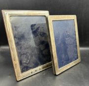 Two hallmarked silver easel backed picture frames, both hallmarked (22cm x 16.5cm and 24cm x 19cm)