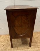 A mahogany Edwardian style record cabinet with oval inlaid door (H77cm W47cm D44cm)