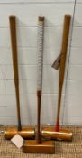 A selection of three antique croquet mallets, various makers brass bound.