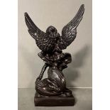 A bronze statue of St Michael The Arc angel Trampling a demon signed Erte (H27.5cm)