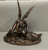 A Bronze of Cupid & Psyche signed to base Biggi Fausto (W 48cm x 50cm H)
