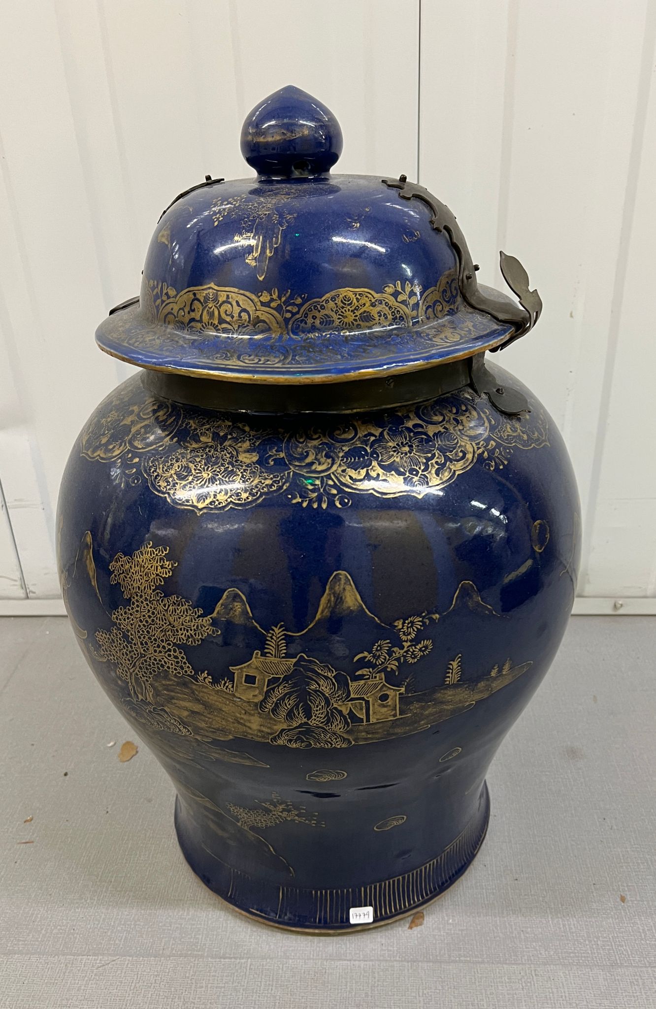 An Oriental lidded jar in blue with metal catch Height 60cm