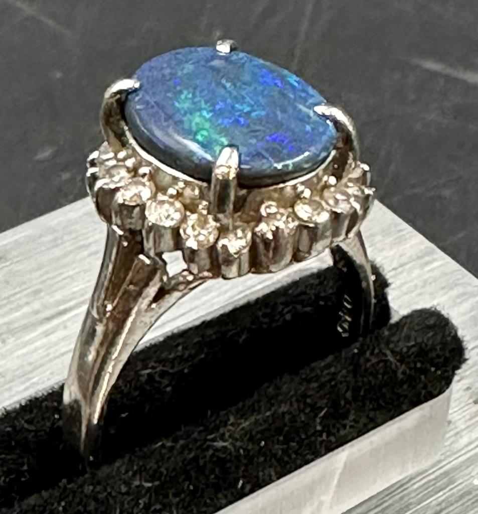 Platinum Opal and diamond ring. Ring is marked PT900 Estimated Opal 2.50 carats Estimated Diamonds