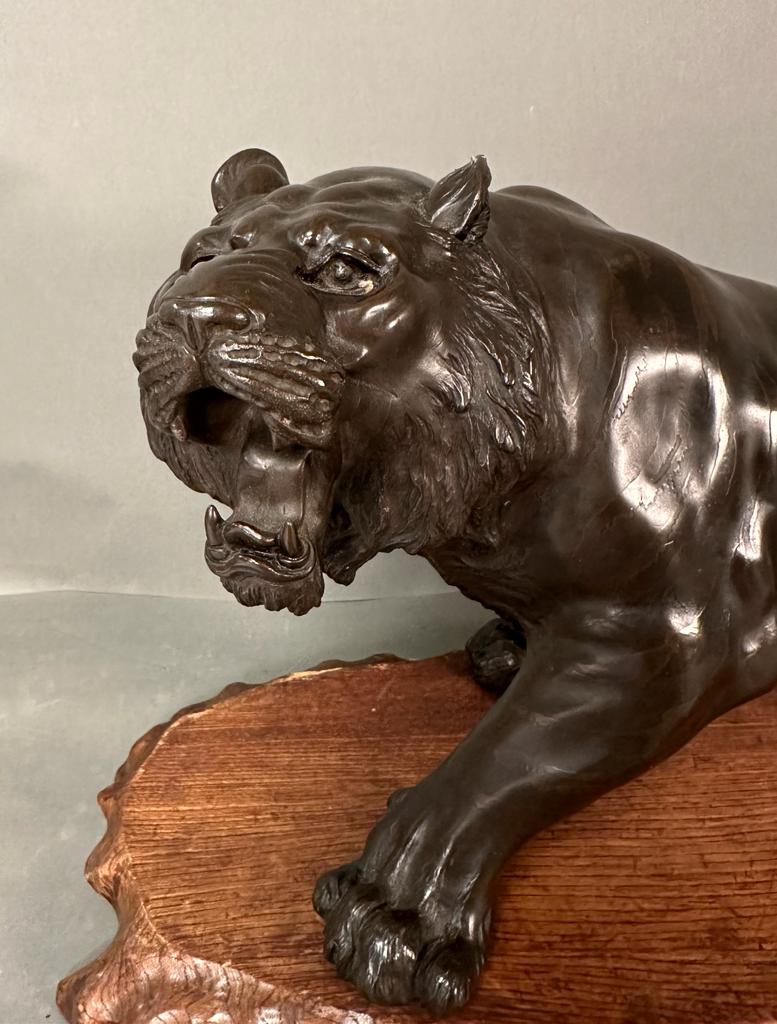 A large bronze lion on stand Japanese Meiji period 19th Century (H32cm W77cm) - Image 5 of 17