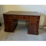 An inlaid pedestal desk with leather top by Brights of Nettlebed (77cm x 76cm x 142cm)