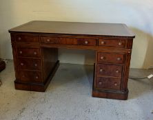 An inlaid pedestal desk with leather top by Brights of Nettlebed (77cm x 76cm x 142cm)