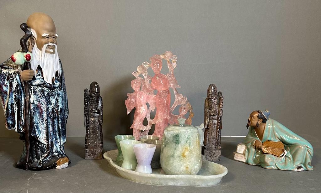 A selection of Chinese items to include two stone figures, two china figures, an AF rose quartz