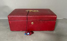 A Governmental Red Pebble Grained Leather Despatch Box C1880, the radial edged top with an inset