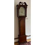 An oak brass dial longcase clock with five pillar movement, seconds and calendar dials also strike/