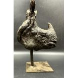 A signed bronze of a Rhinoceros head on stand. H22cm W15cm D10cm