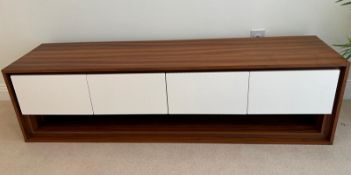 A long low media unit with four white gloss drawers (H50cm W180cm D45cm)