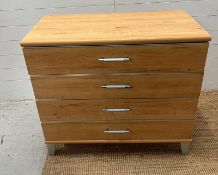 A contemporary chest of drawers (H87cm W95cm D46cm)