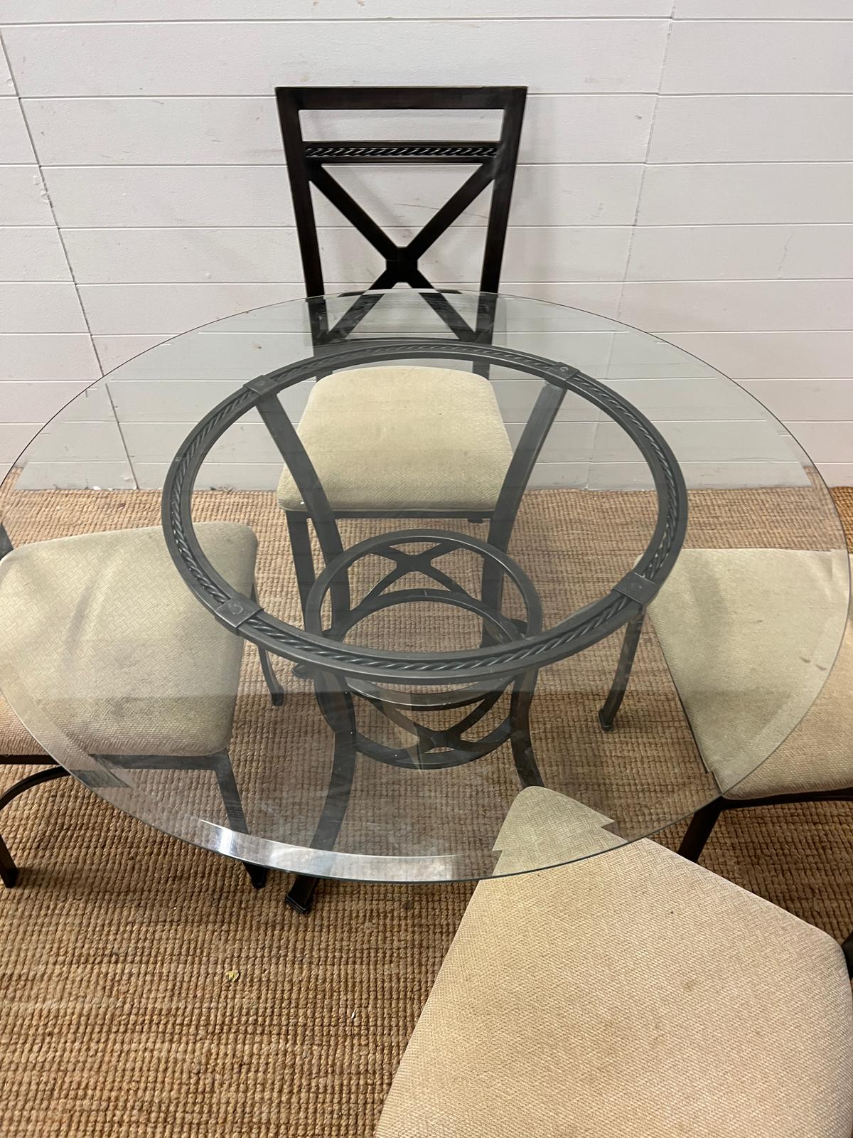 A contemporary glass and metal dining table with four chairs (H75cm Dia114cm) - Image 5 of 5