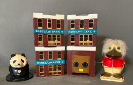A selection of Barclays bank home scales and two TSB money boxes