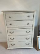 A contemporary chest of drawers, consisting of six drawers, two with knob handles and three with
