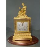 A French Empire ormolu clock with calendar dial by Brocot Gilt bronze AF
