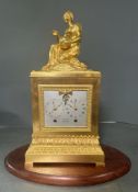 A French Empire ormolu clock with calendar dial by Brocot Gilt bronze AF