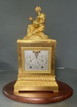 A French Empire ormolu clock with calendar dial by Brocot Gilt bronze AF