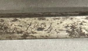 A French cavalry sword in scabbard inscribed 1824 AF