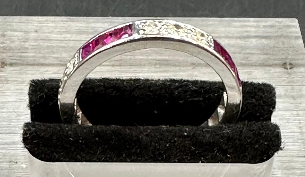 18 carat white gold ruby and diamond eternity ring. - Image 2 of 3