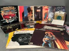 A selection of vinyl LP's and singles to include Gladys Knight and the Pips, Donna Summer and Rod