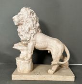 A sculpture of a stately lion resting on an anvil (H49cm)
