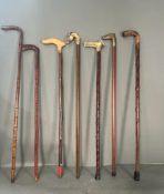 A selection of seven vintage walking sticks