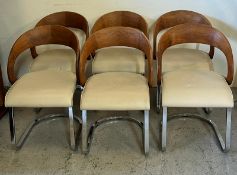 A set of six Girado chairs in walnut, chrome with leather seat pads.