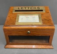 An Edwardian letter box with brass fittings by J C Vickery 25cm x 20cm x 18cm with locking hinged