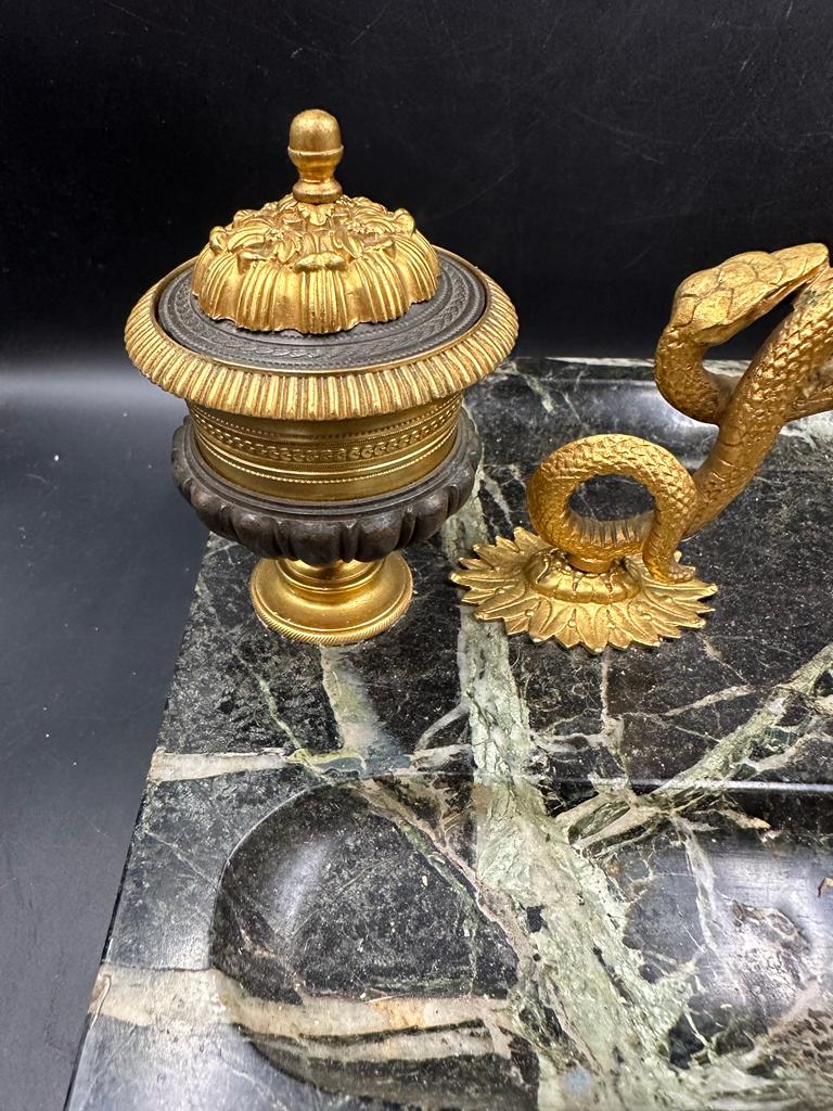 An inkwell in bronze and marble on lion paw feet with twisted snake handle (One foot needs - Image 2 of 6
