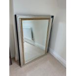 A contemporary mirror with a rope detail to edge (74cm x 106cm)