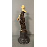 An Art Deco style bronze and resin figure of a lady on a marble plinth (H43cm)