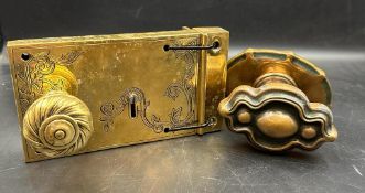 Two antique door handles in brass