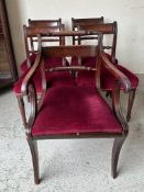 A set of four Regency style mahogany dining chairs and one matching carver