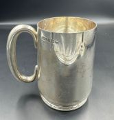 A silver tankard, hallmarked Birmingham 1931, by Daniel & Arter (Approximate total weight 423g and